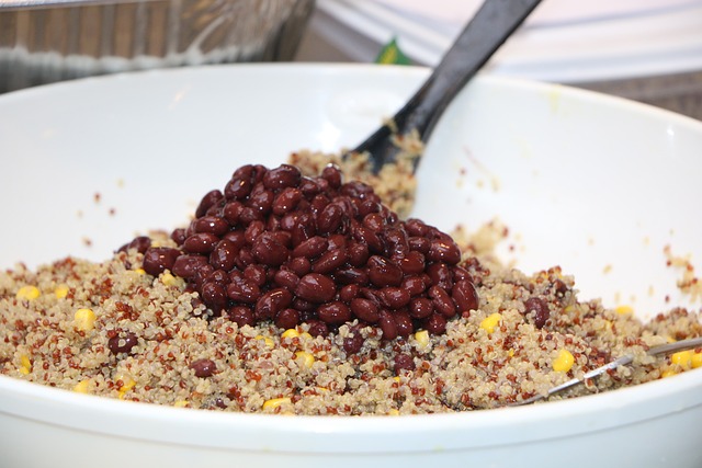 Cooked quinoa and beans in a bowl