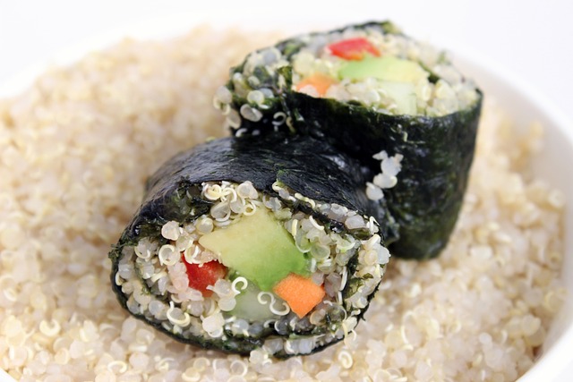 A vegan sushi roll made of quinoa grains